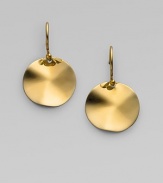 Undulating gold discs are simple yet dramatic in sophsiticated drops. 18k yellow gold Drop, about 1 Diameter, about ½ Ear wire Imported