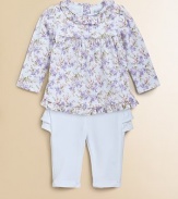 A whimsical floral print lends cute, sweet style to a girlie cotton tunic, paired perfectly with ruffled pants.Ruffled crewneckLong sleevesBack buttonsElastic waistband Pleated yokeRuffled hemElastic waistbandCottonMachine washImported Please note: Number of buttons/snaps may vary depending on size ordered 