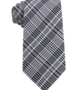 Start a crossover in your wardrobe. This tie from DKNY gives a punch of plaid to your nine-to-five.