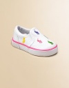 Cute, colorful polo players adorn this slip-on style with a comfy padded insole. Elastic gore detail Cotton upper Polyester lining Imported