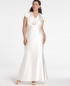 Eliza J's captivating plus size satin gown is a vision with its delicate lace details and fully buttoned back (which cleverly disguises a more convenient zipper). You're sure to be stunning in this sweeping, royal wedding-inspired dress. (Clearance)