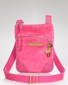 Soft and saturated. Juicy Couture's velour crossbody is a wear close comfort that goes steady with your favorite denim.