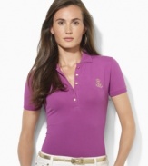 Rendered in soft stretch cotton mesh, Lauren Ralph Lauren's classic petite polo shirt is designed with a chic five-button placket and accented with an embroidered crest