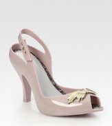 Glassy style with an adjustable slingback strap and unique goldtone bow adornment. Self-covered heel, 4½ (125mm)Rubber upperPadded insoleImported