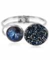 Two's welcome company on this bangle from Kenneth Cole New York. Crafted from silver-tone mixed metal, the bracelet features a blue faceted glass bead and a silver-tone concave disc adorned with beads for a stylish touch that's twice as nice. Approximate diameter: 2-1/3 inches.