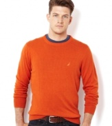 Pop some color into your layered look with this orange crew neck sweater from Nautica.