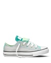 Double tongue Converse sneakers. A colorful canvas classic that transcends the ages.