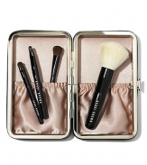 For flawless makeup application wherever you go, we kitted our travel brush set with 4 tools of the trade (in totable sizes). Inspired by Bobbi's Caviar & Oyster Collection, this limited edition set feels chic yet edgy in a sleek leather-like case. No need to wrap, this set comes in a Bobbi Brown gift box covered in a pretty pearl print. Set includes: Mini Face Blender Brush; Mini Eye Shadow/ Ultra Fine Eyeliner Brush; New Mini Smokey Eye Liner Brush; Mini Lip Brush with cap. Made in USA. 