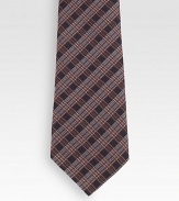 A sartorial standard woven in Italian silk.About 2.8 wideSilkDry cleanMade in Italy