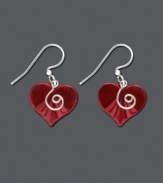 Embrace love with bold red hearts. Earrings by Jody Coyote are crafted in red patina brass with a swirling silver accent charm. Set in sterling silver. Approximate drop: 1-1/8 inches.