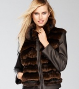 Cold weather mixology: a faux fur vest becomes an edgy jacket when combined with faux leather sleeves and modern styling.