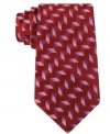 Make strides in sophisticated style with this patterned silk tie from Michael Kors.