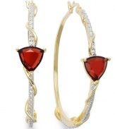 Classic earrings get a sparkly update. Victoria Townsend's stunning hoop earrings feature trilliant-cut garnet (6 ct. t.w.) and sparkling diamond accents in 18k gold over sterling silver. Approximate diameter: 1-3/4 inches.