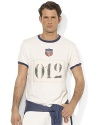 Accented with bold country embroidery to celebrate Team USA's participation in the 2012 Olympic Games, a short-sleeved ringer T-shirt is designed for a trim, modern fit from breathable cotton jersey.