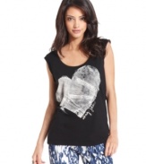 This soft tank from DKNY Jeans is anything but basic. It features a metallic heart and logo design at the front for a bit of flirty style and a cool silhouette for the right downtown edge.