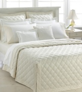 Diamond quilting in soft cotton brings to mind the elegance of vintage bedding in this Lauren by Ralph Lauren's quilted coverlet. Featuring a paneled drop with split corners and button detailing and a channeled hem.