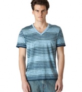 Ditch the crew-neck and get hip to the streetwear styling of this striped V-neck from Calvin Klein Jeans.