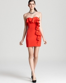 A cascading ruffle infuses this fiery-hued Jay Godfrey strapless dress with chic femininity.