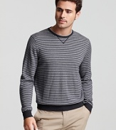 With its tonal ministripe pattern and elbow patch accents, this soft merino wool sweater is a subtle way to add texture to your cold-weather look.