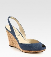 Comfort-minded denim wedge with a stretchy slingback and low-cut upper. Cork wedge, 4 (100mm)Cork platform, 1 (25mm)Compares to a 3 heel (75mm)Denim upperLeather lining and solePadded insoleImported