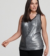 This shimmering Karen Kane tank becomes your glamour go to for a fashion-forward season.