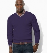 A long-sleeved sweater is designed in luxurious jersey-knit Pima cotton with a preppy V-neckline for refined, masculine polish.