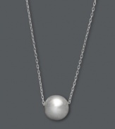 Round out your look with smooth curves. This versatile and polished pendant highlights a shiny bead slide (8 mm) strung from a delicate chain. Crafted in sterling silver. Approximate length: 18 inches.