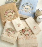 Add an elegant dash of English grace to your powder room with Avanti Rosefan hand towels. Embroidered with a delicate flower design and finished with a textured jacquard border.