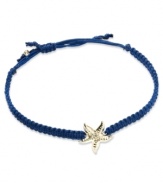 Star attraction. A 14k gold starfish centers this navy nylon bracelet for a whimsically stylish effect. Bracelet adjusts to fit wrist. Approximate diameter: 3-1/2 inches.