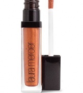 Instantly plumps, hydrates and moisturized for healthier, sexy lips. A refreshing, cooling effect builds up over 20 minutes to plump lips, lasting up to two hours. Adds a slight tint to the lips for natural looking lips. Apply liberally to the lips using the applicator or the Laura Mercier Lip Colour Brush. 0.18 oz. 