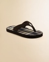 Slip his feet into these comfy and cozy in these flip flops with plaid insole and signature pony embroidery.Slip-onSportbuck upperCotton liningRubber solePadded insoleImported