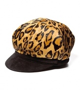 Go for a fierce style in an animal printed newsboy hat with contrast black brim.