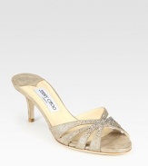 Fairytale-inspired metallic leather silhouette with glitzy rhinestone embellishments. Self-covered heel, 2½ (65mm)Metallic leather upperLeather lining and solePadded insoleMade in ItalyOUR FIT MODEL RECOMMENDS ordering one half size up as this style runs small. 