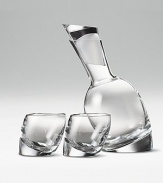 This modern bar set has all the angles: a full lead crystal decanter with matching stopper and two gently tilted double old-fashioned glasses. Handmade Comes in Nambé blue gift box 11 decanter 10 oz. glasses Hand wash gently Imported