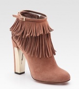 On-trend suede fringe emboldened by a partially metal heel and dainty, wrap-around buckle. Suede and metal heel, 4½ (115mm) Suede upper Side zipper Leather lining and sole Padded insole Made in ItalyOUR FIT MODEL RECOMMENDS ordering one half size up as this style runs small. 