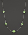 From the Contempo collection, chain necklace with five peridot-crystal stones. Designed by Judith Ripka.