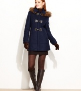 The combination of toggle closures and luxe faux fur trim makes for an instant-classic coat from Calvin Klein.