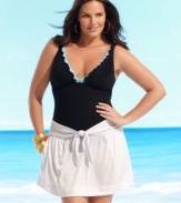 Slip on this plus size cover up for effortlessly chic beach style by J Valdi.