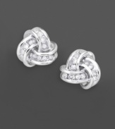 Round-cut diamonds (1/5 ct. t.w.) make a classic style sparkle. Earrings set in 14k white gold.