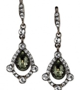 A proper mix of subtle and bold. Givenchy's small drop earrings, crafted from hematite-tone mixed metal, feature a dark glass crystal stone in the center offset by lustrous accents. Approximate drop: 4 inches.