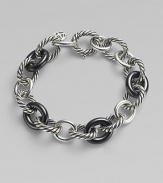 From the Chain Collection. A trinity of signature cable, plain, and black ceramic oval links.Ceramic Sterling silver Length, about 7½ Lobster clasp closure Imported 