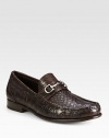 A classic, yet comfortable loafer design is constructed in crocodile with signature silver bit detail.Crocodile upperLeather liningPadded insoleLeather soleMade in ItalyOUR FIT MODEL RECOMMENDS ordering true size. 