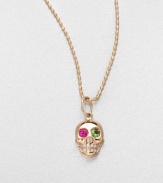 From the Edge Collection. A 14k rose gold skull with ruby and green garnet eyes on a ball chain. 14k rose goldRuby and green garnetLength, about 16Pendant size, about .4 Lobster clasp closureMade in Italy and imported