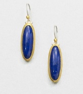 A beautiful, speckled lapis cabochon set in 24k gold accented with sleek sterling silver. LapisSterling silver24k goldDrop, about 1.4Hook backImported 