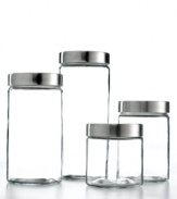 Simple glass canisters with silvertone metal lids offer extensive storage for rice, cereal, pasta and any number of boxed pantry items to preserve freshness and minimize clutter.