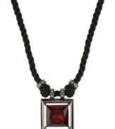 Dark tones dazzle in this pendant from Kenneth Cole New York. Dangling from a twisted cord is a square pendant crafted from hematite-tone mixed metal with a red faceted stone at the center for a bold statement.  Approximate length: 18 inches + 3-inch extender. Approximate drop: 2 inches.