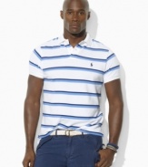 Classic stripes lend a crisp, polished look to a relaxed-fitting polo shirt in breathable cotton mesh.