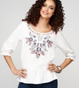 A peplum hem and charming embroidery elevate a classic peasant top from BandolinoBlu. Complete the boho-chic look with hoop earrings or an armful of bangles.