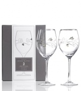 A perfect pair, this set of Novelty Silhouette wine glasses combines a simply beautiful shape with stylized florals for a look that's fun yet refined. Coordinates with Platinum Silhouette dinnerware, also by Charter Club.