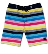 Catch a wave in rad beach style. These swim shorts from Hurley are your summer style staple.